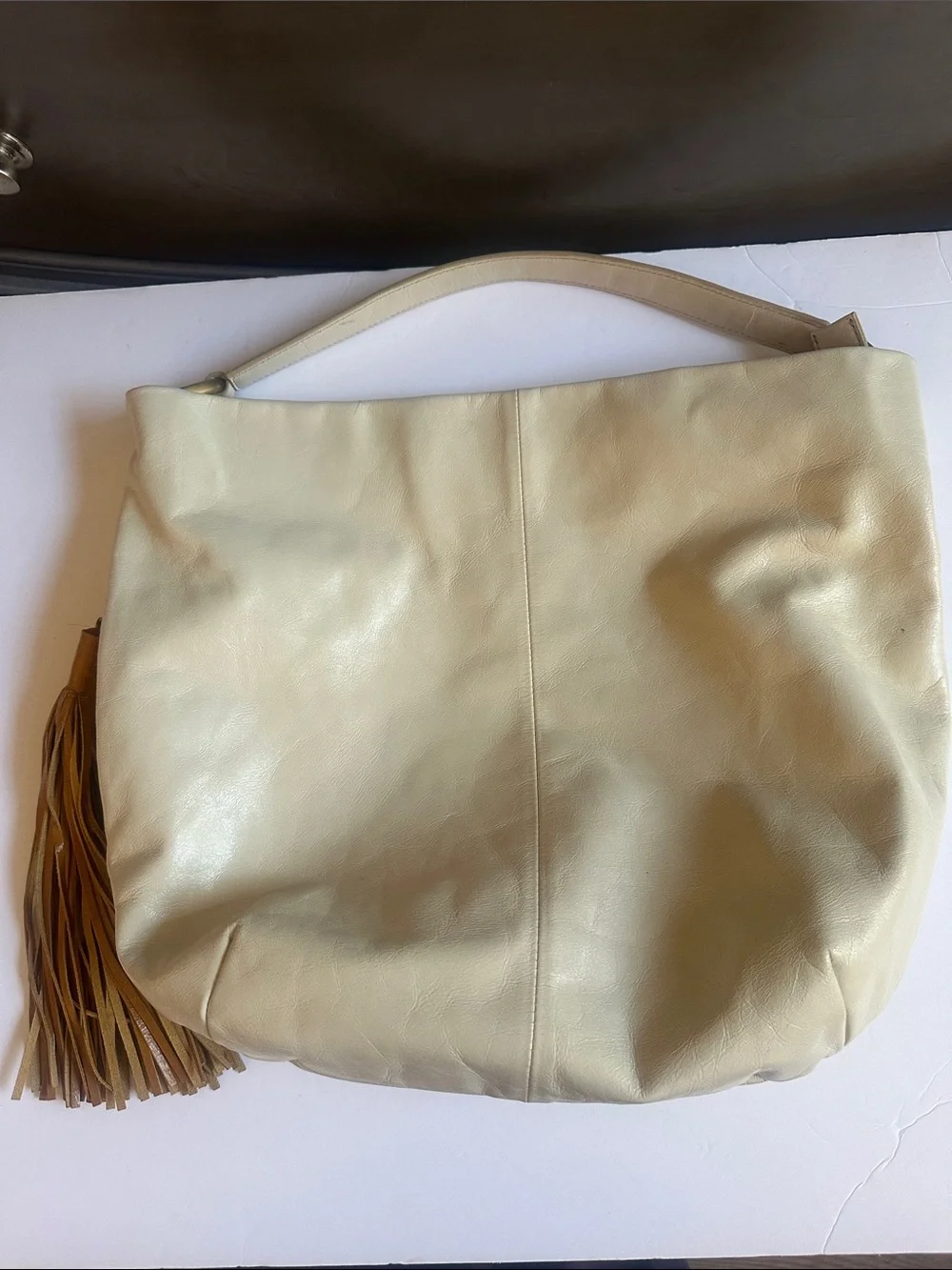HOBO Cream Leather Hobo with Tassel Accent